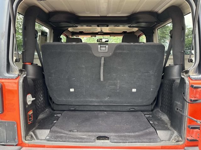 Used 2015 Orange Jeep Sahara image 29