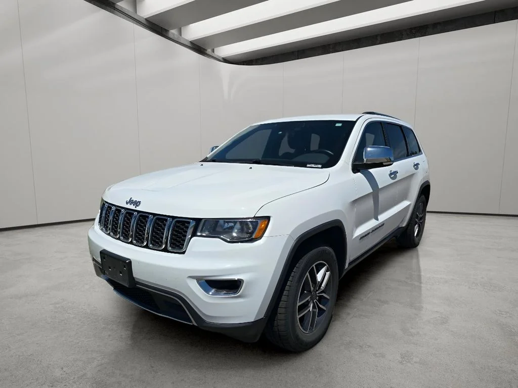 Used 2019 Bright White Clearcoat Jeep Limited image 1