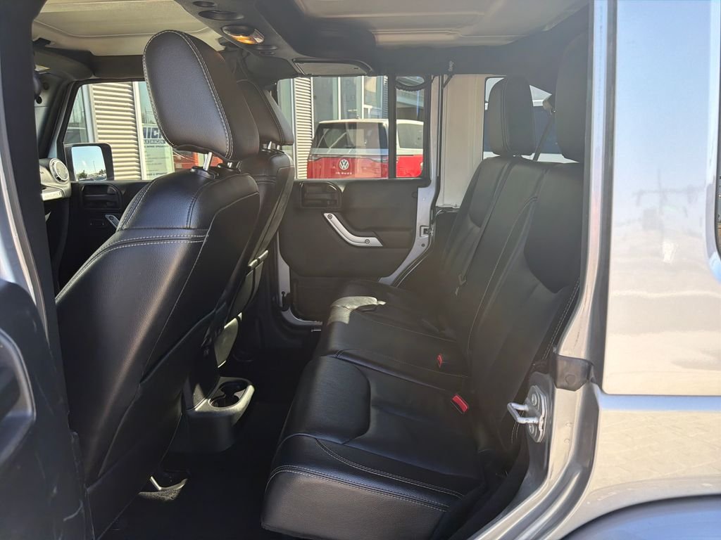 Used 2016 Silver Jeep Unlimited Sahara image 11