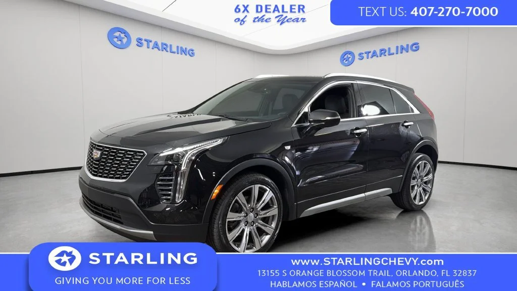 Used 2023 STELLAR BLACK METALLIC Cadillac FWD Premium Luxury image 1