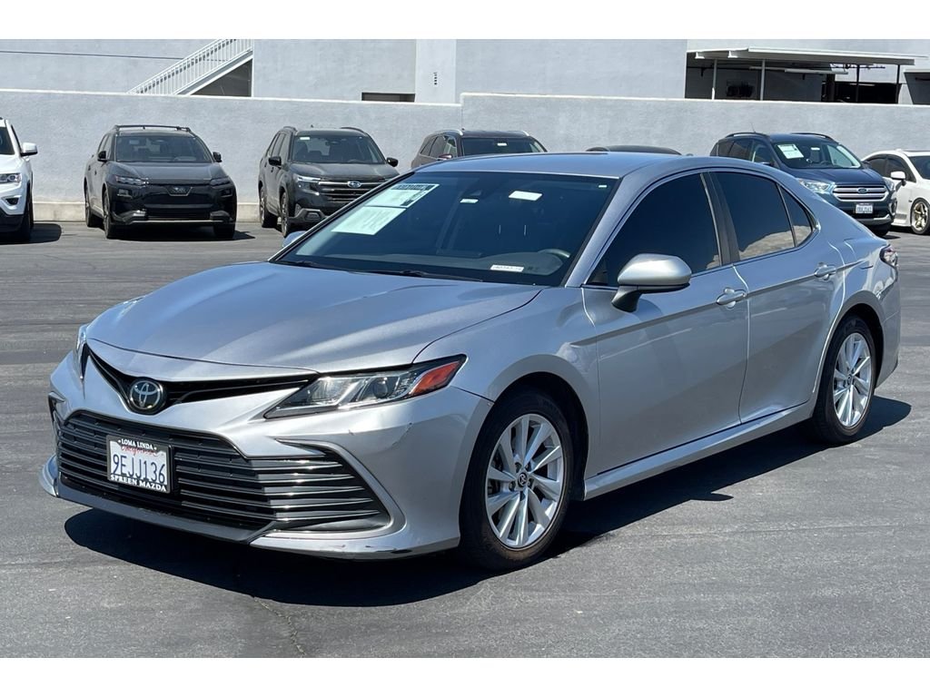 Used 2023 Celestial Silver Metallic Toyota LE image 2