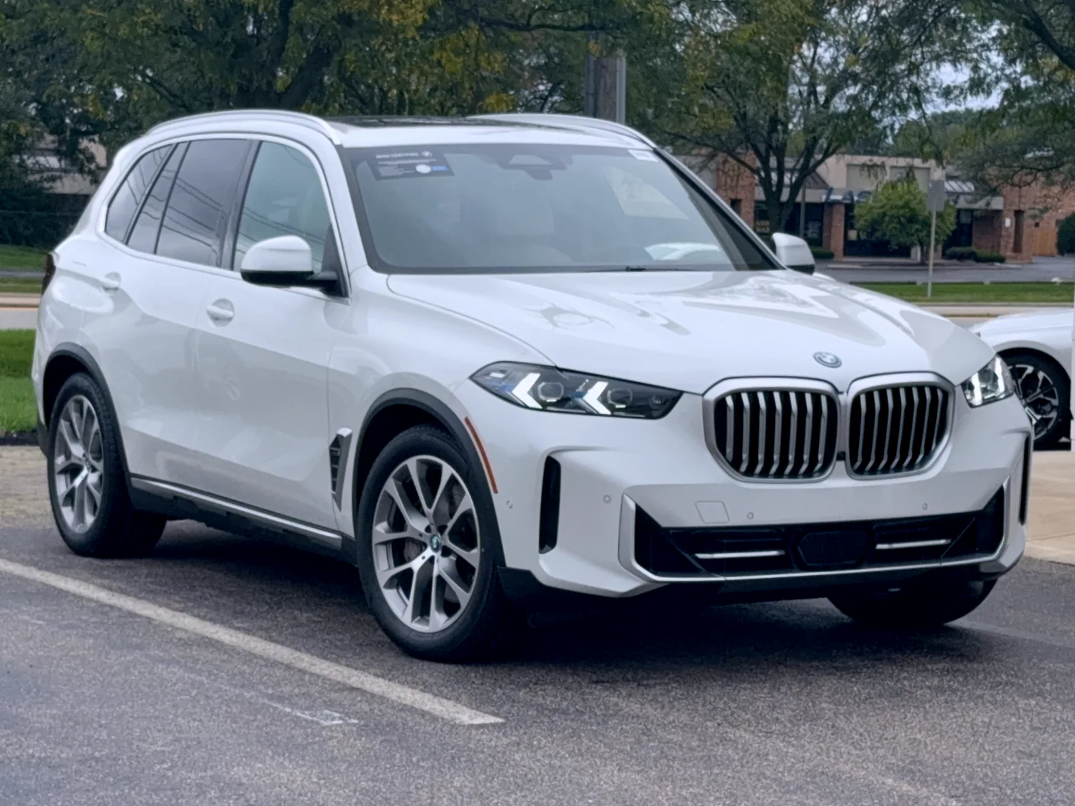 Certified Used 2024 Mineral White Metallic BMW xDrive50e image 1