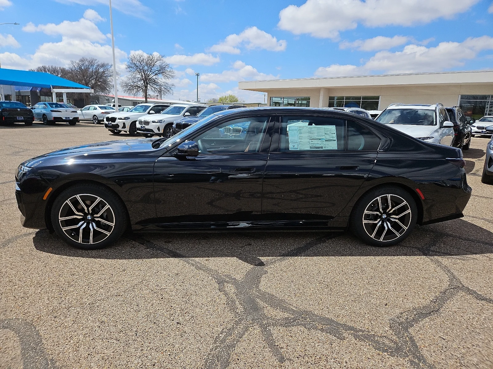 New 2024 Black Sapphire Metallic BMW xDrive60 (A1) All-Wheel Drive image 2