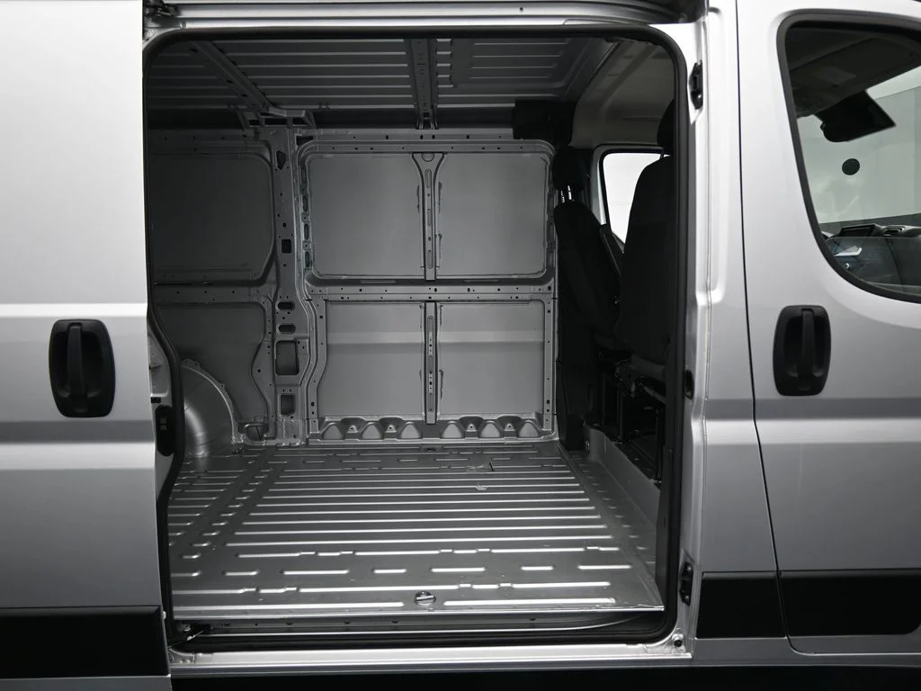 Used 2025 Bright Silver Clearcoat Metallic Ram Low Roof image 30