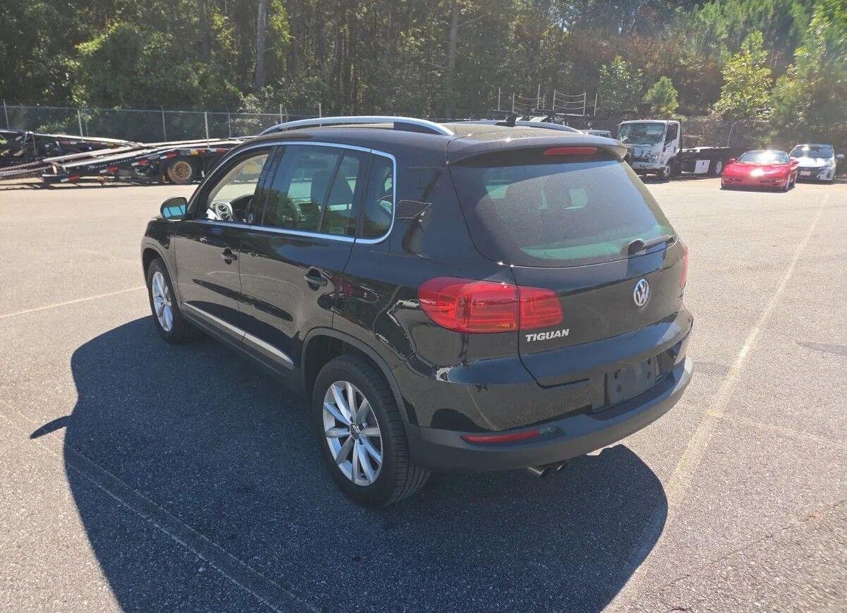 Used 2017 Deep Black Pearl Volkswagen Wolfsburg Edition image 4
