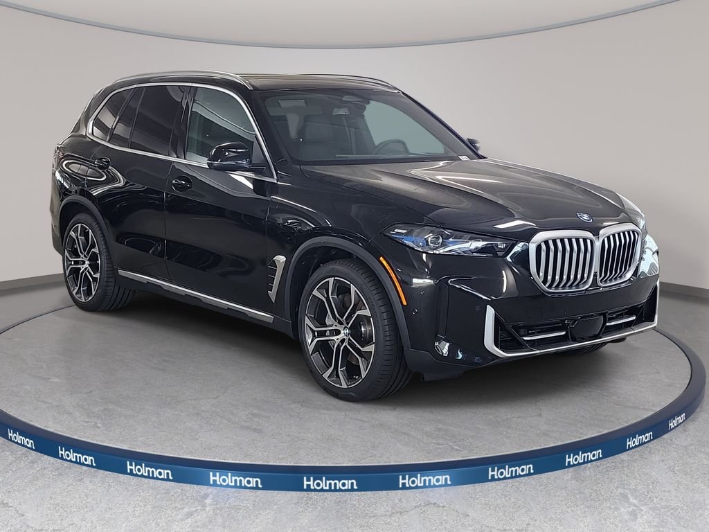 New 2026 Black Sapphire Metallic BMW xDrive50e image 3