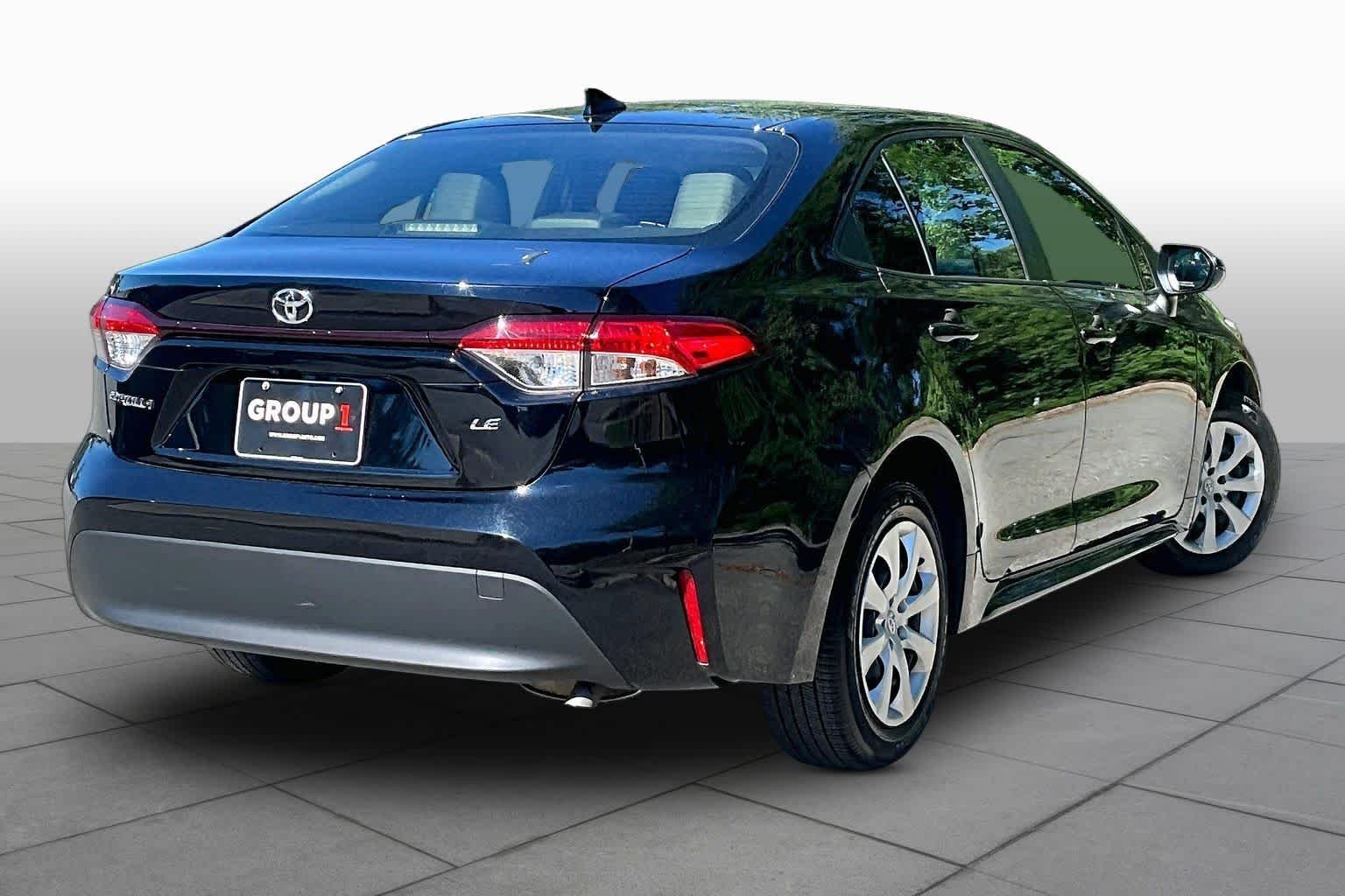 Used 2024 Midnight Black Metallic Toyota LE image 24