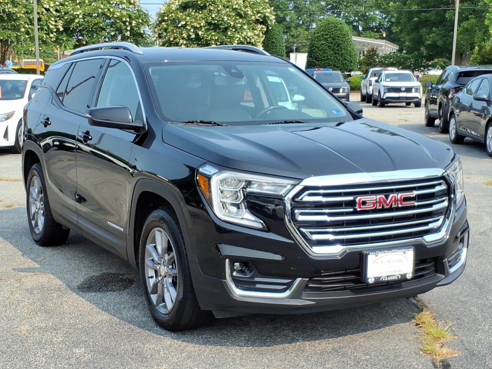 Used 2024 Ebony Twilight Metallic GMC SLT image 5