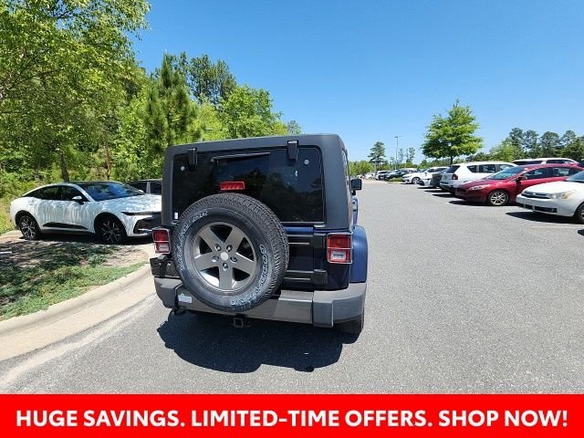 Used 2013 Blue Jeep Unlimited Sport image 14