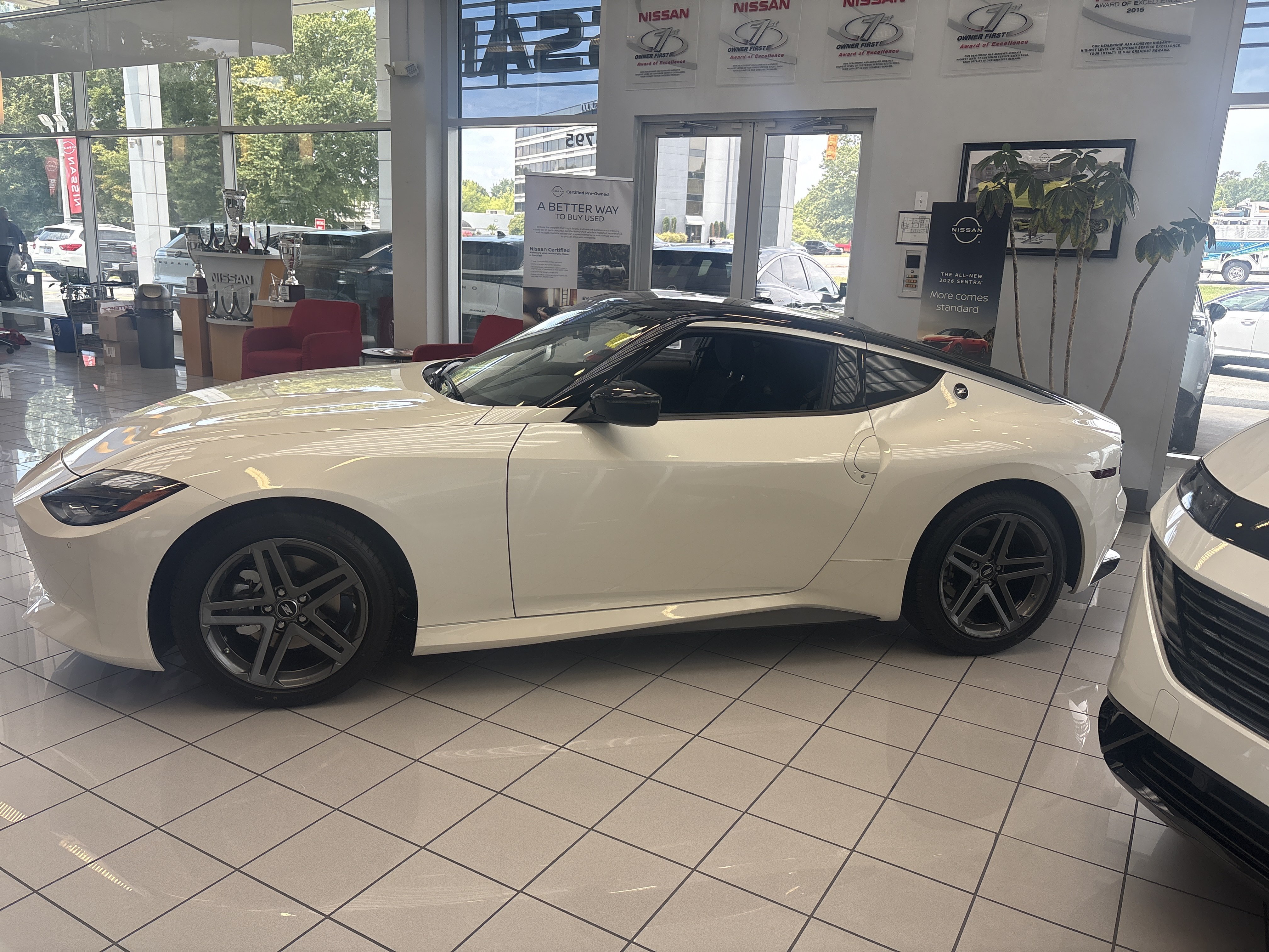 New 2026 Pearl White Tricoat/Super Black Nissan Sport image 2