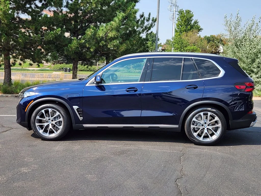 New 2026 Tanzanite Blue II Metallic BMW xDrive50e image 2
