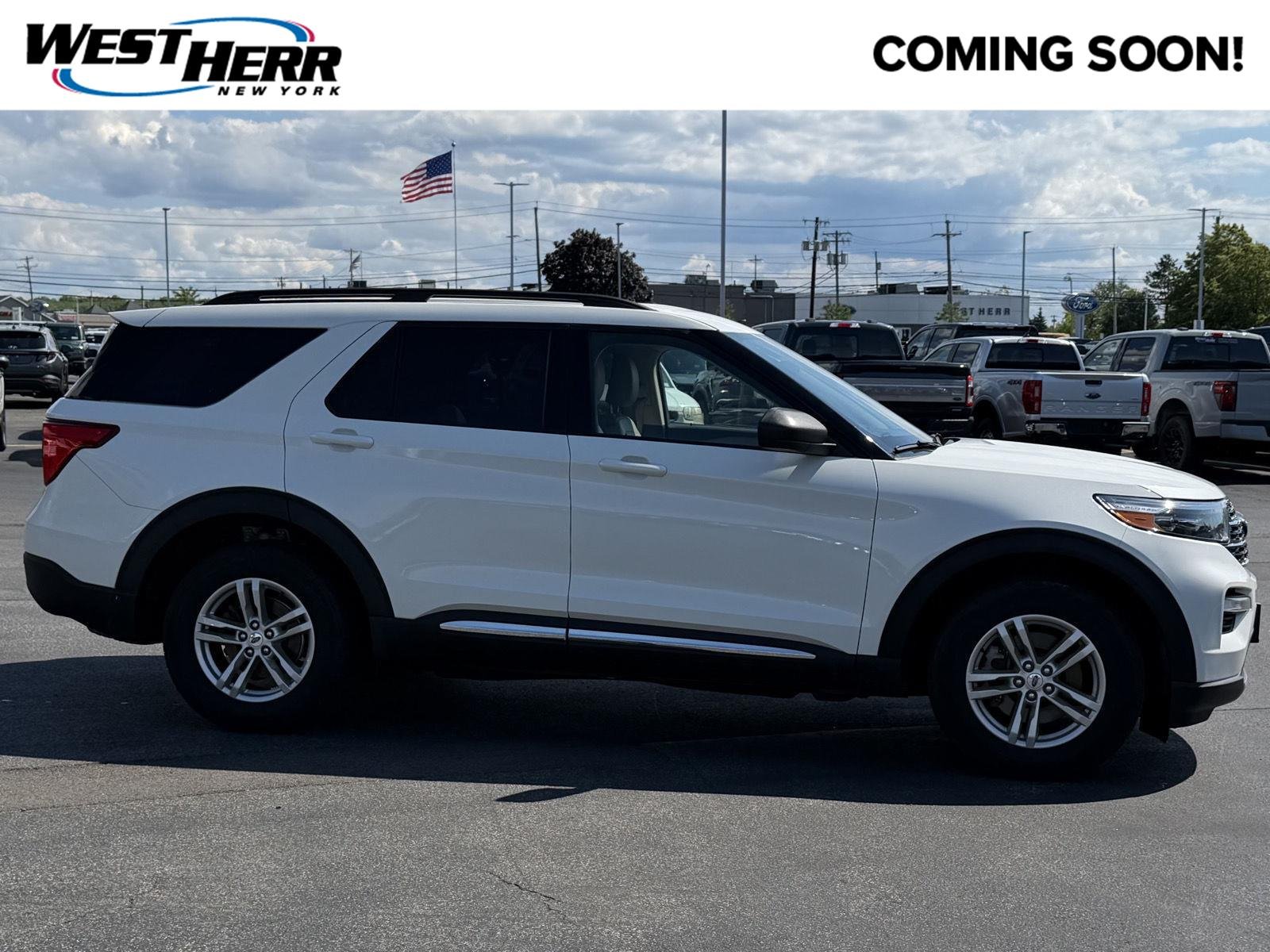Used 2023 Star White Metallic Tri-Coat Ford XLT image 1