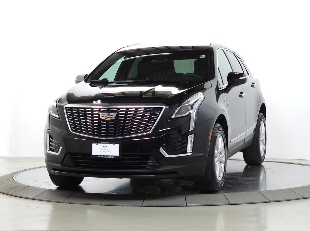 Used 2023 Stellar Black Metallic Cadillac Luxury image 1