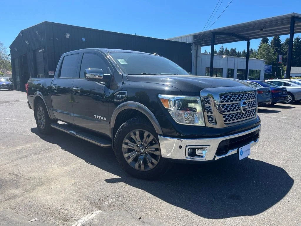 Used 2017 Black Nissan Platinum Reserve image 1