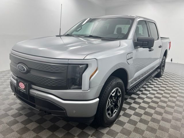 Used 2023 Ford F-150 Lightning XLT with VIN 1FTVW1EL2PWG50923 for sale in Cranston, RI
