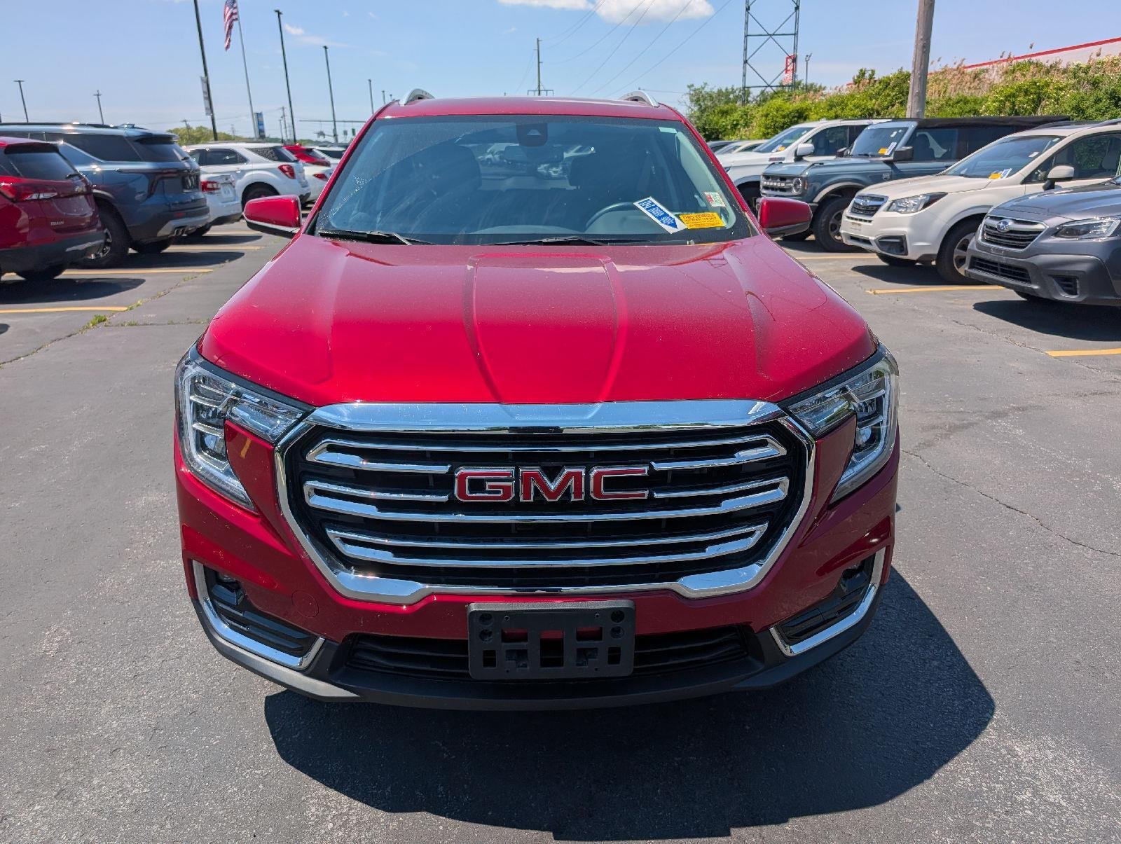 Used 2024 Volcanic Red Tintcoat GMC SLT image 2