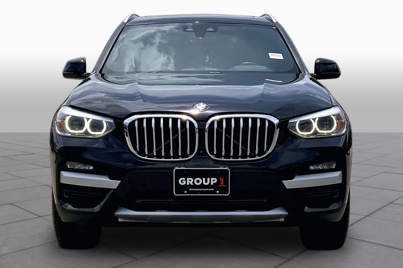 Used 2021 Jet Black BMW sDrive30i image 4