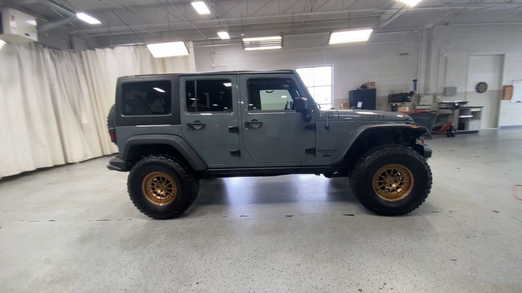 Used 2014 Jeep Wrangler Unlimited Sport with VIN 1C4BJWDG4EL262741 for sale in Royal Oak, MI