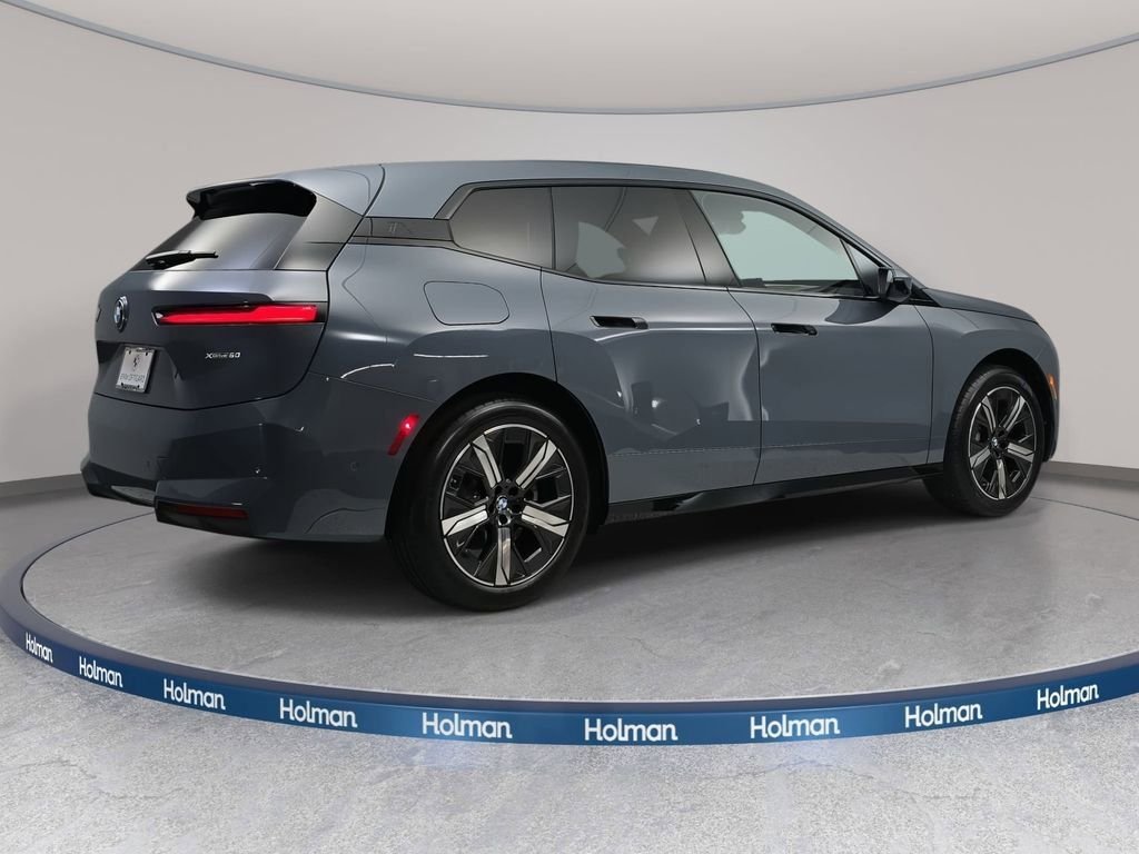 Used 2026 Storm Bay Metallic BMW xDrive60 image 5