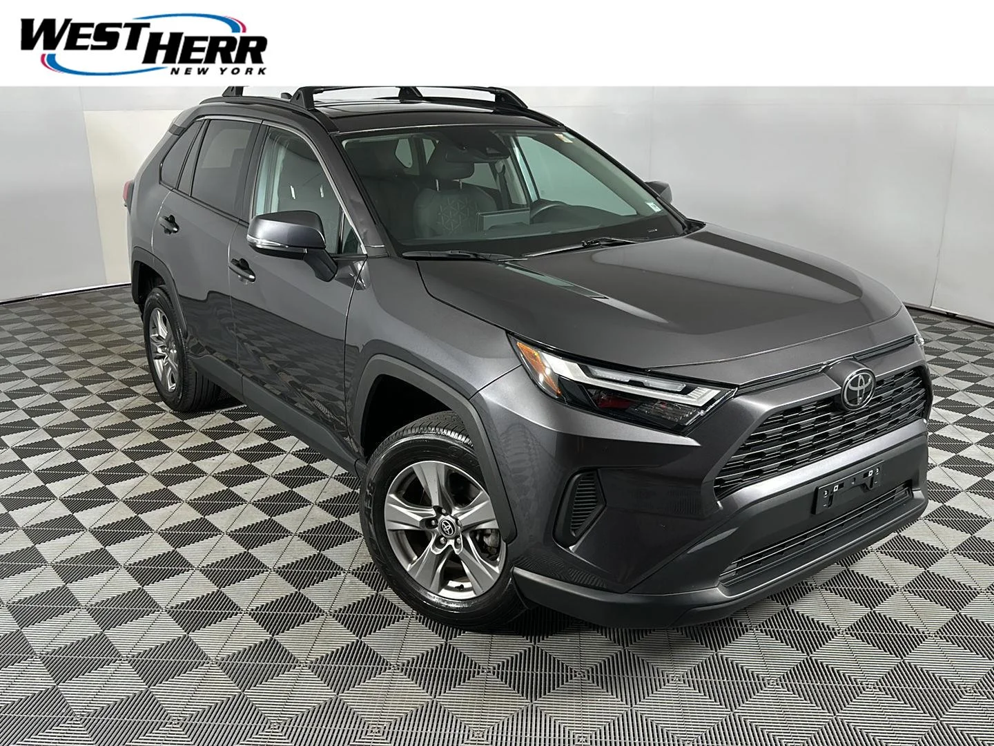 Used 2024 Magnetic Gray Metallic Toyota XLE image 1