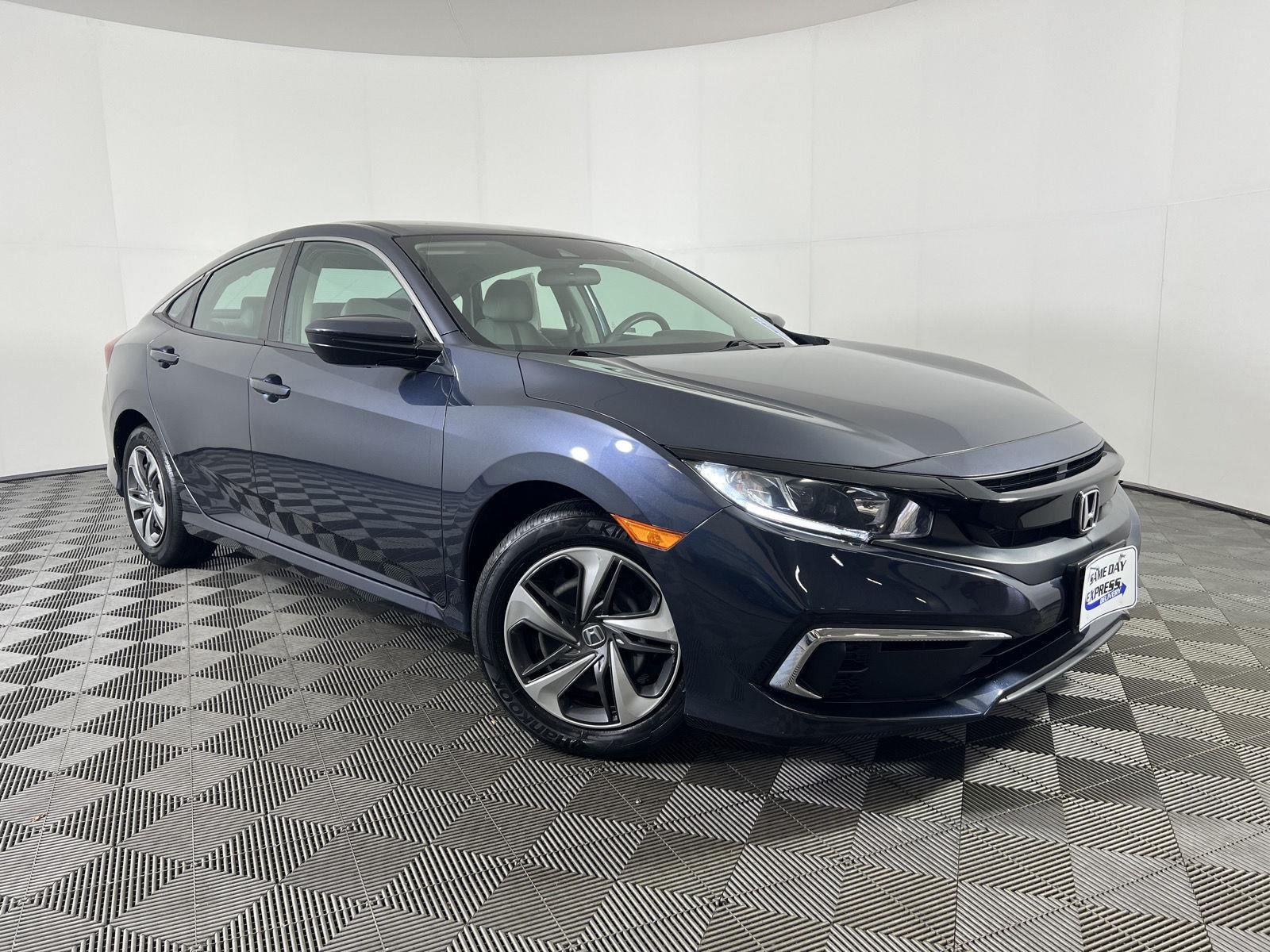 Used 2020 Cosmic Blue Metallic Honda LX image 1