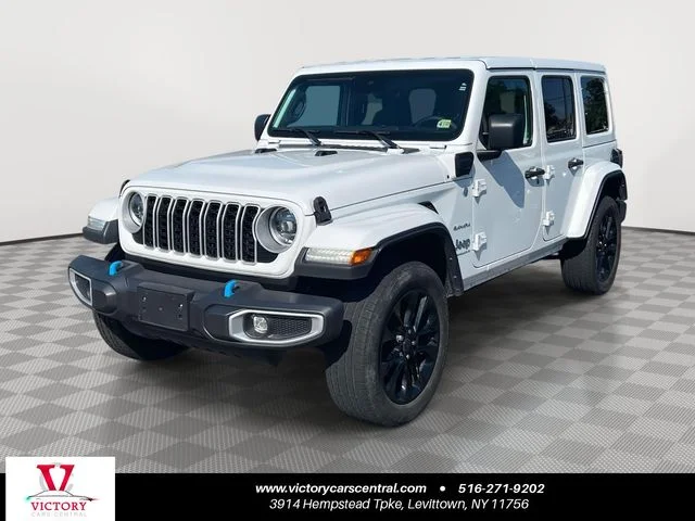 Used 2024 White Jeep Sahara 4xe image 1