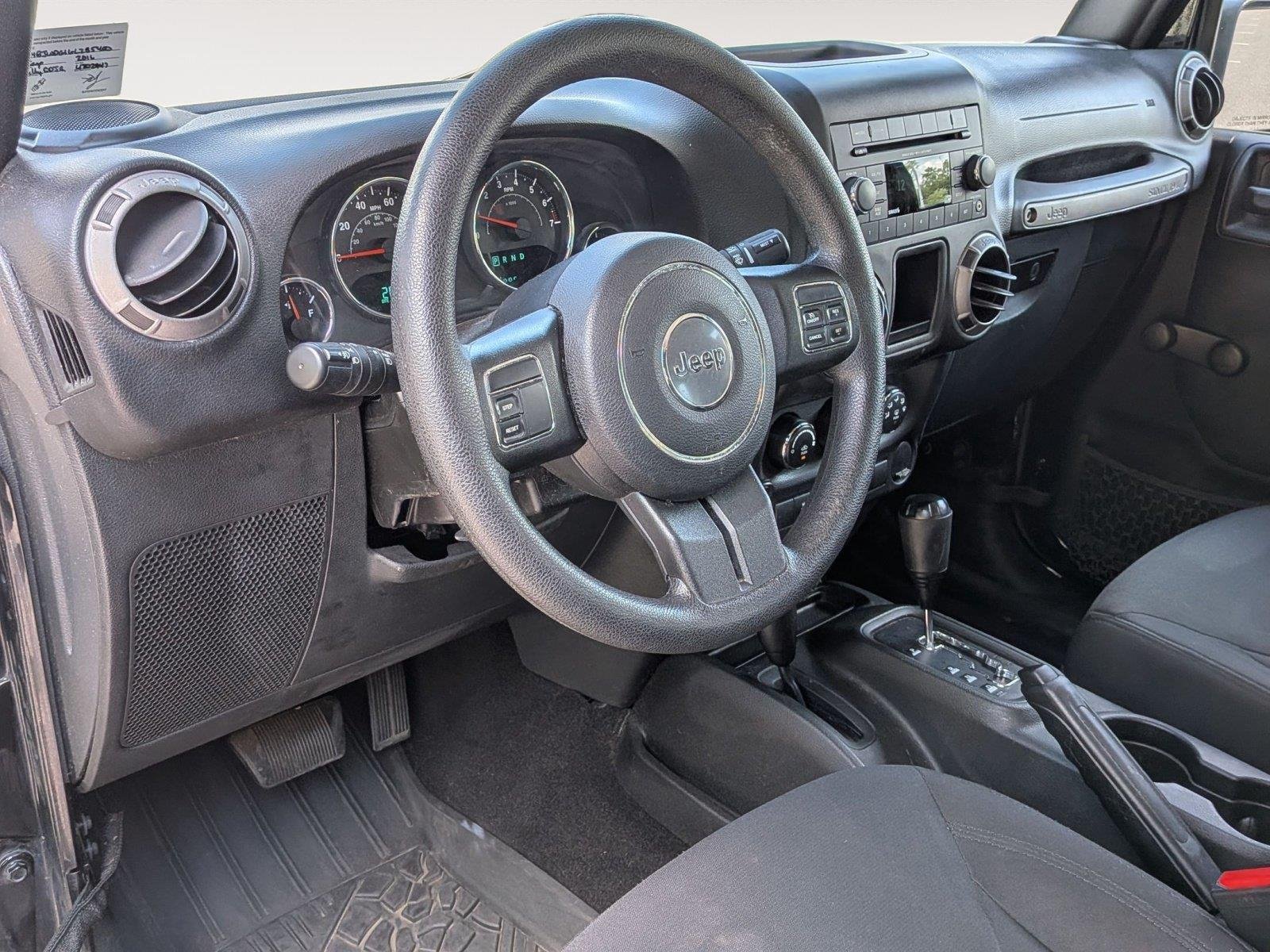 Used 2016 Black Clearcoat Jeep Sport image 10