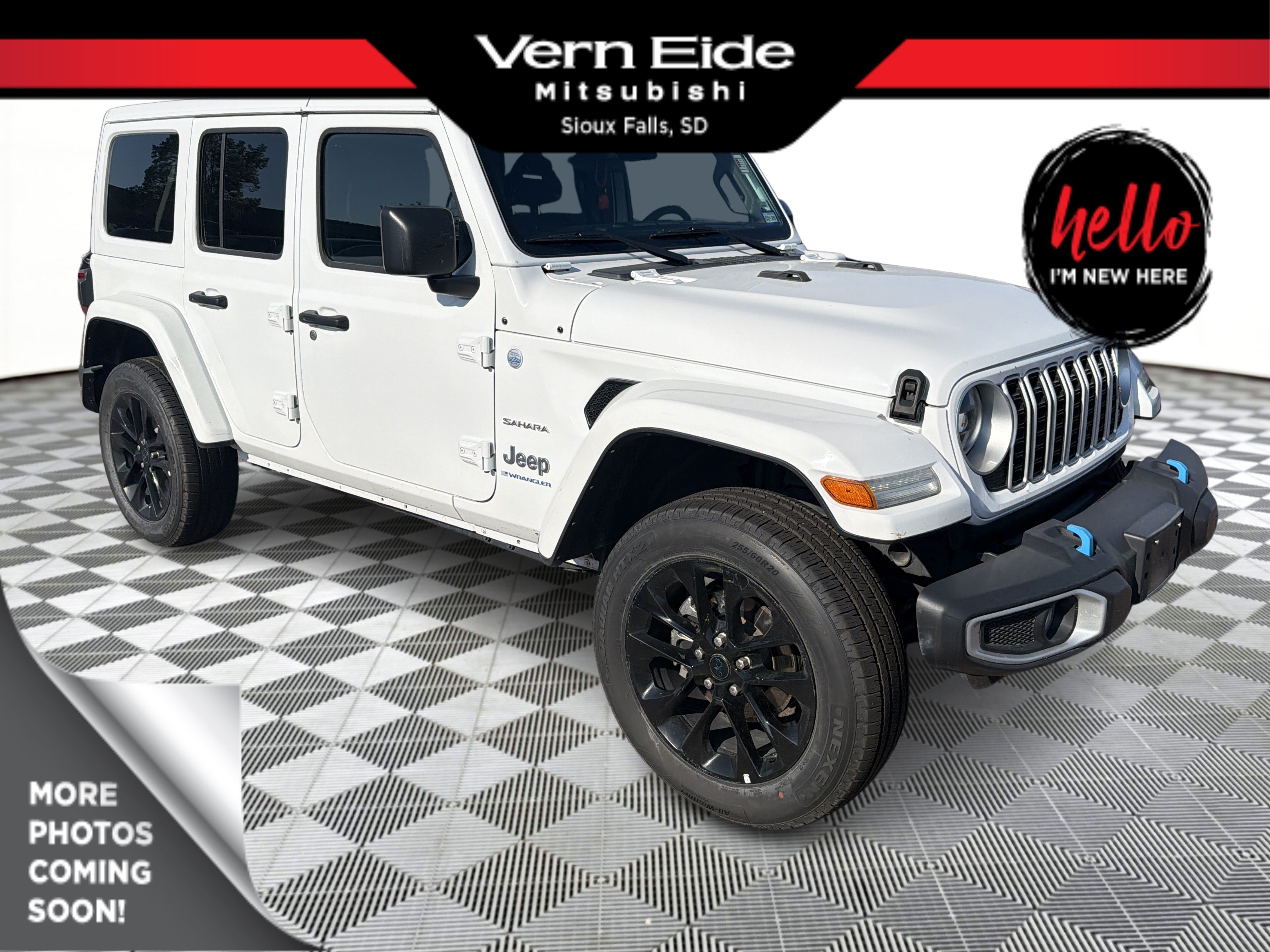 Used 2024 Bright White Clearcoat Jeep Sahara image 1