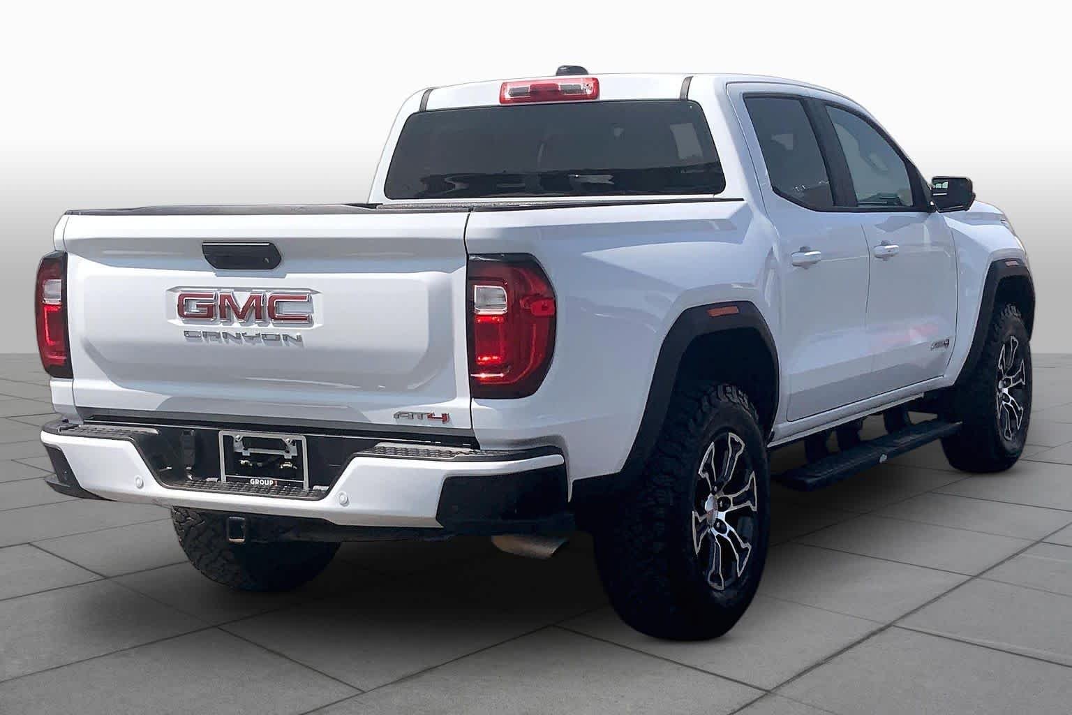 Used 2024 Summit White GMC 4WD AT4 image 26