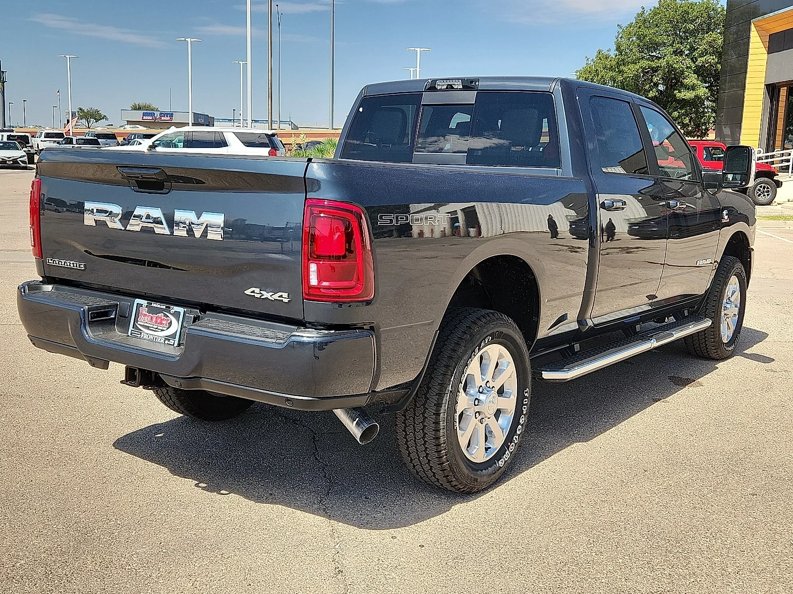 New 2026 Forged Blue Metallic  Paint Ram LARAMIE CREW CAB 4X4 6