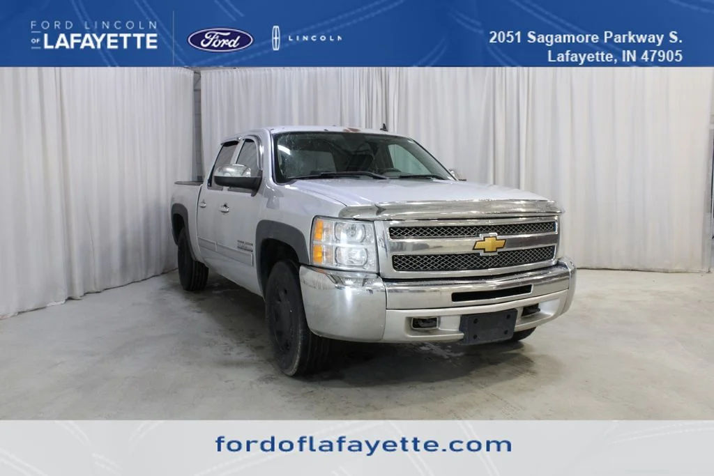 Used 2012 White Chevrolet LS image 1