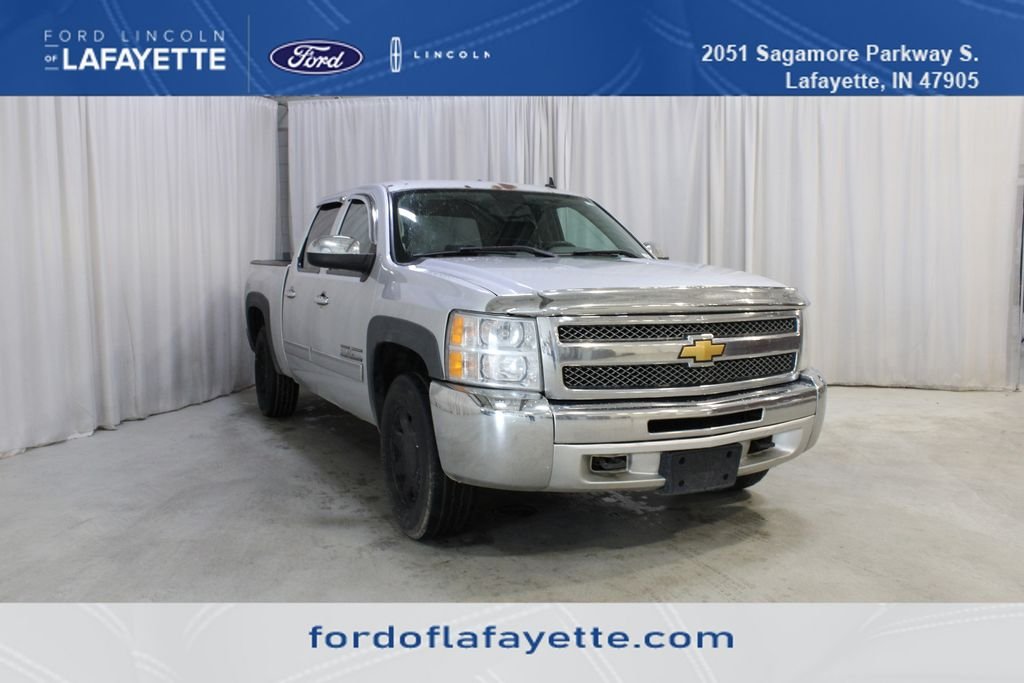 Used 2012 White Chevrolet LS image 1