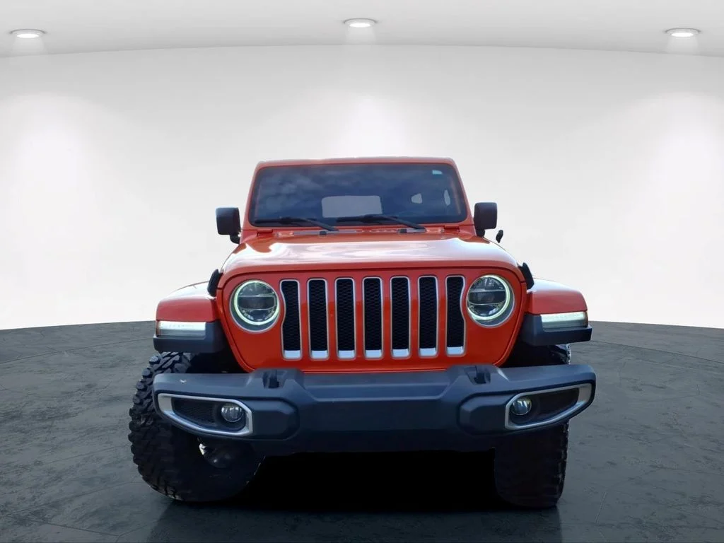 Used 2018 Orange Jeep Unlimited Sahara image 3