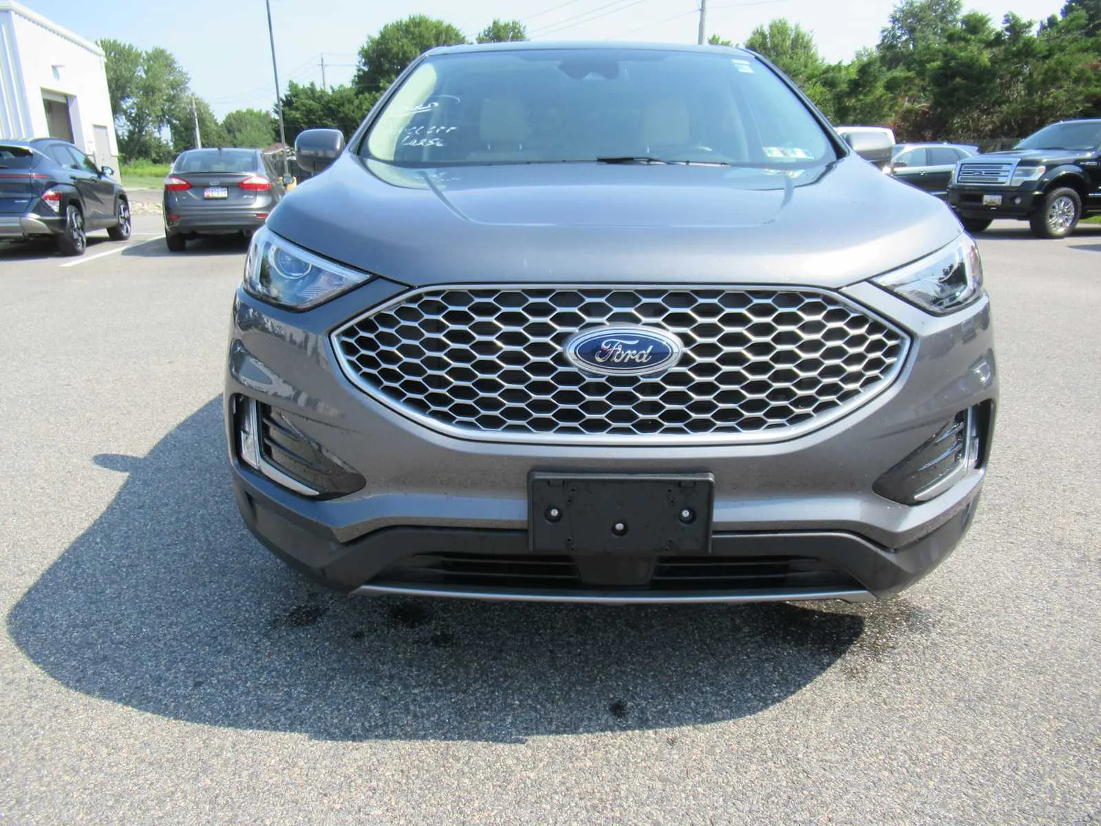 Used 2024 Carbonized Gray Ford SEL image 2