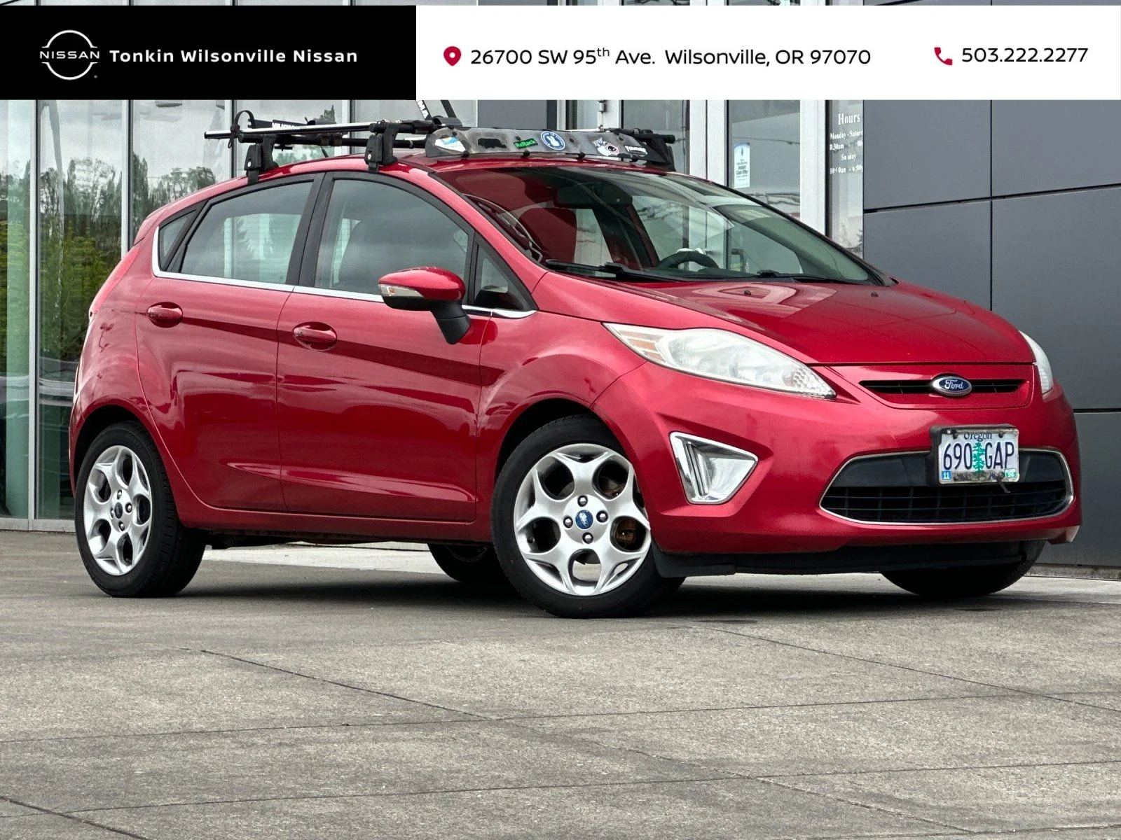 Used 2011 Red Candy Ford SES image 1