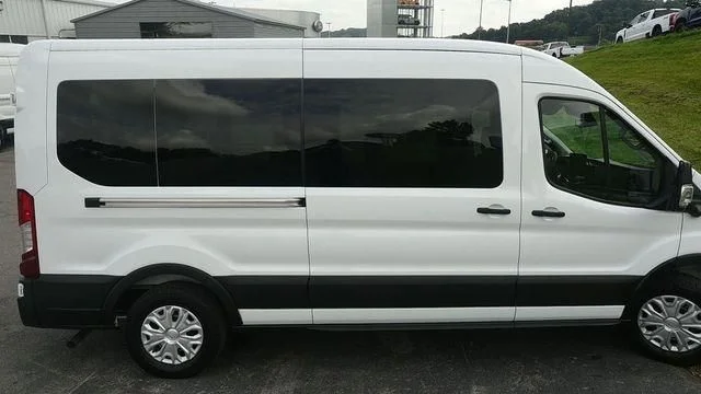 New 2026 Oxford White Ford Passenger Van XLT image 10