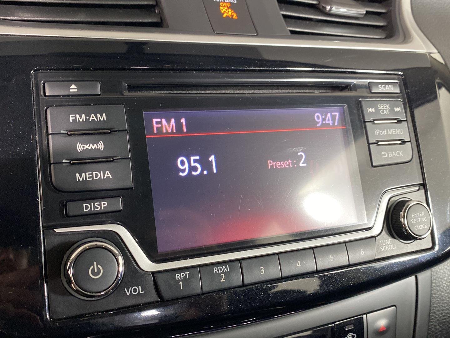 Used 2018 Gun Metallic Nissan SV image 2