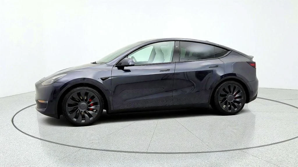Used 2024 Stealth Grey Tesla Performance AWD w/ White & Black Interior image 8