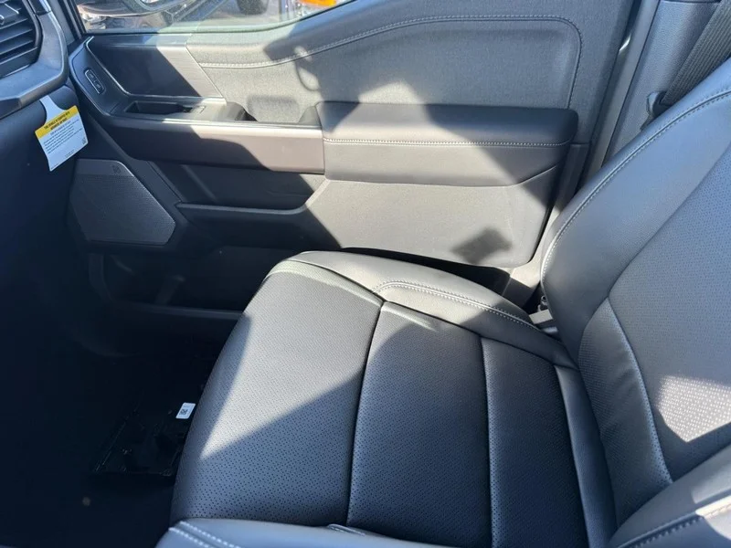 New 2026 Carbonized Gray Metallic Ford LARIAT 4WD SuperCrew 5.5