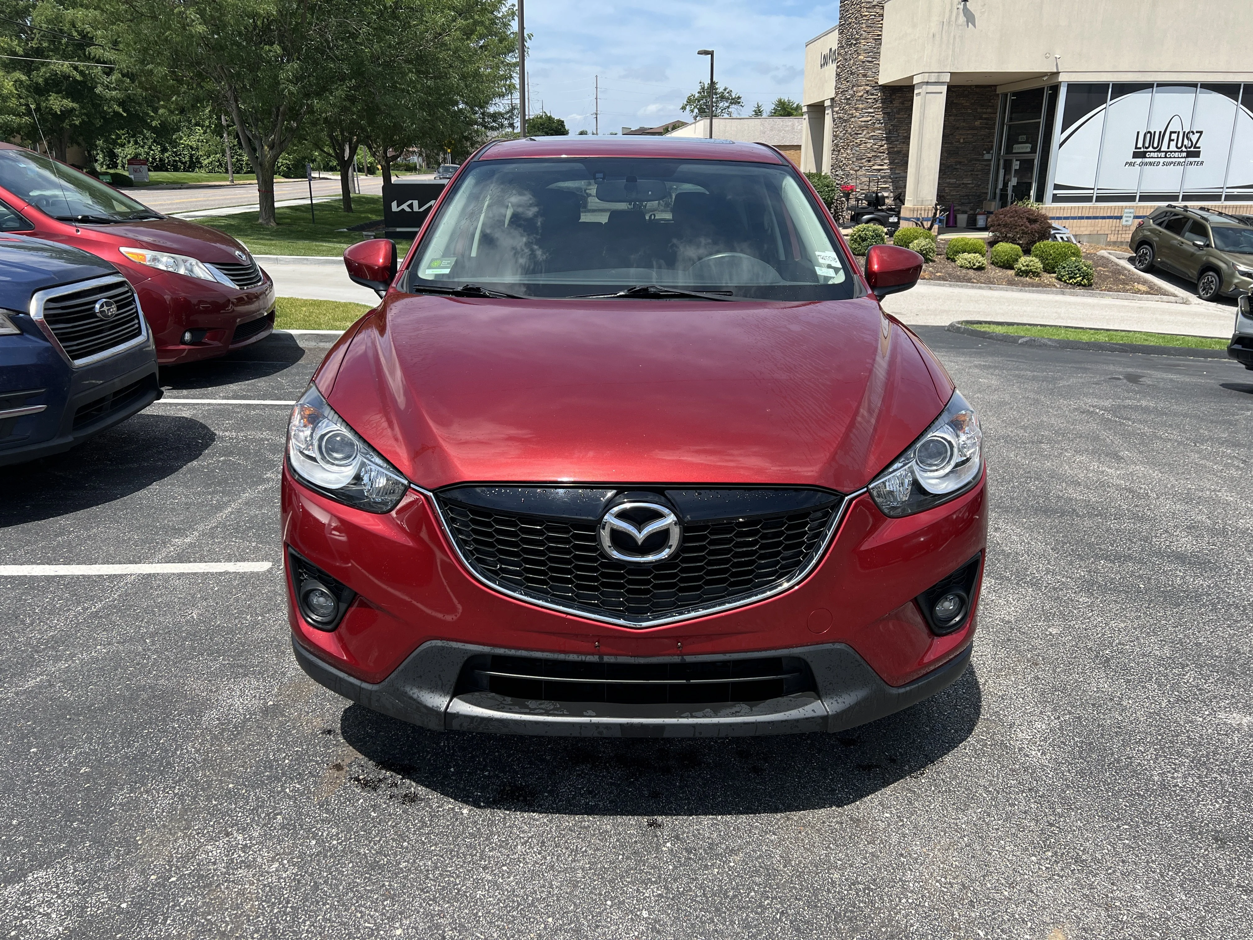 Used 2013 Zeal Red Mica Mazda Touring image 2