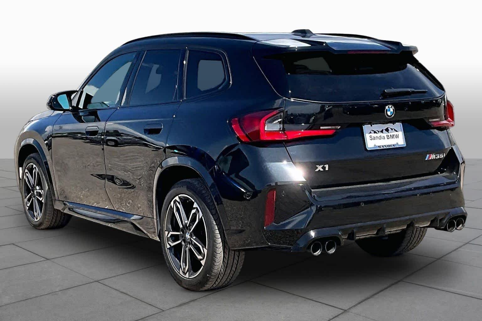 Certified Used 2024 Black Sapphire Metallic BMW M35i image 9