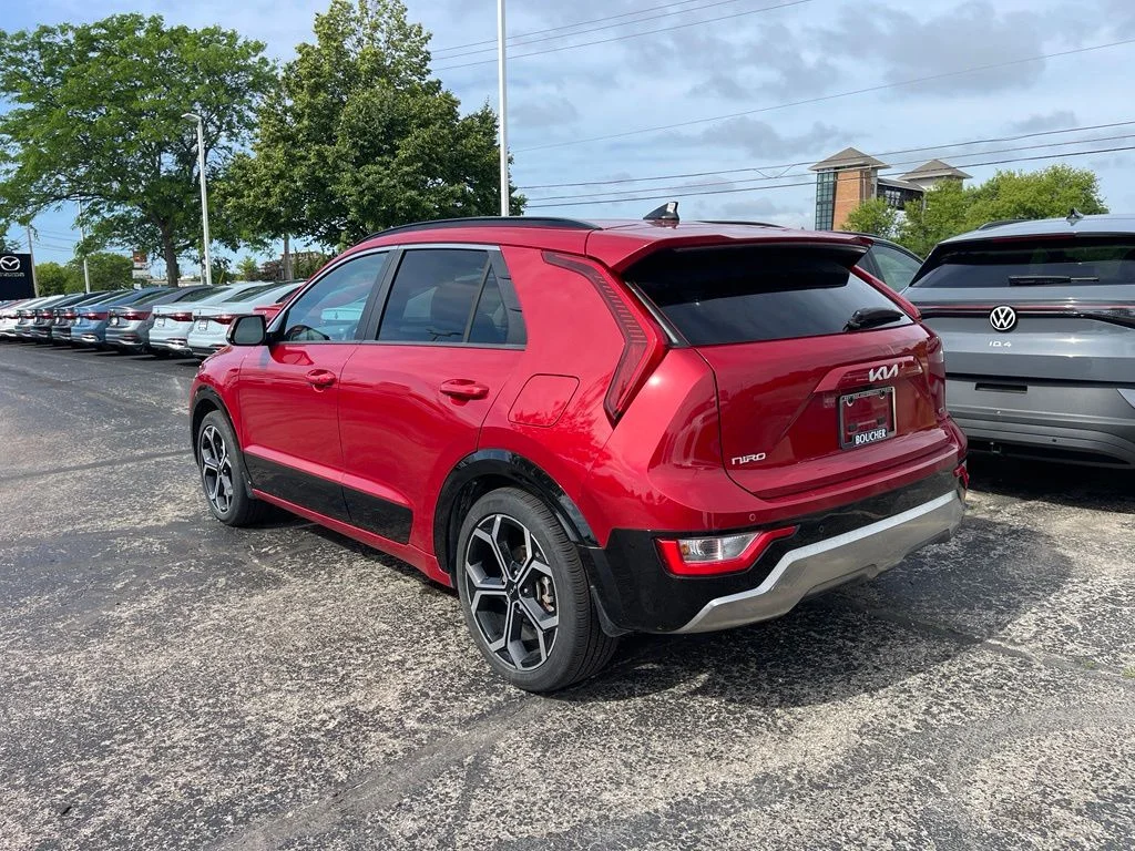 Certified Used 2025 Runway Red Kia EX Touring image 2