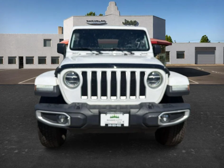 Used 2019 Bright White Jeep Sahara image 1