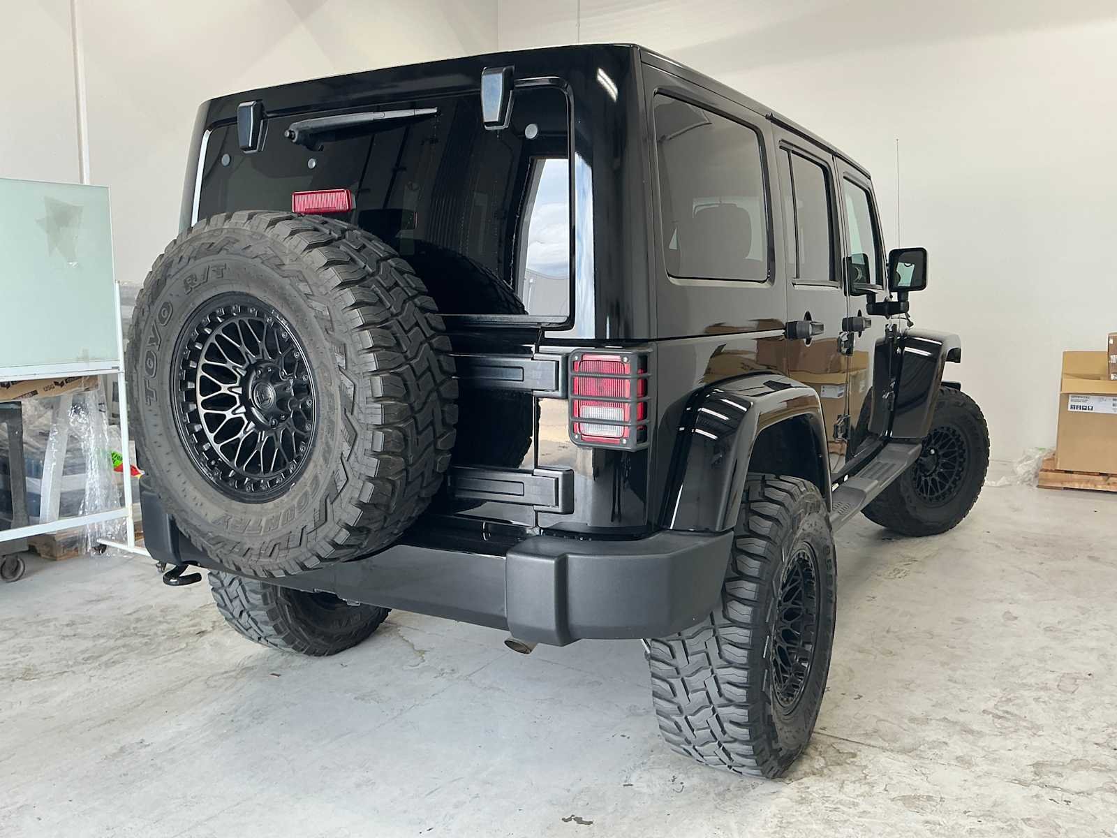 Used 2016 Black Clearcoat Jeep Sahara image 4