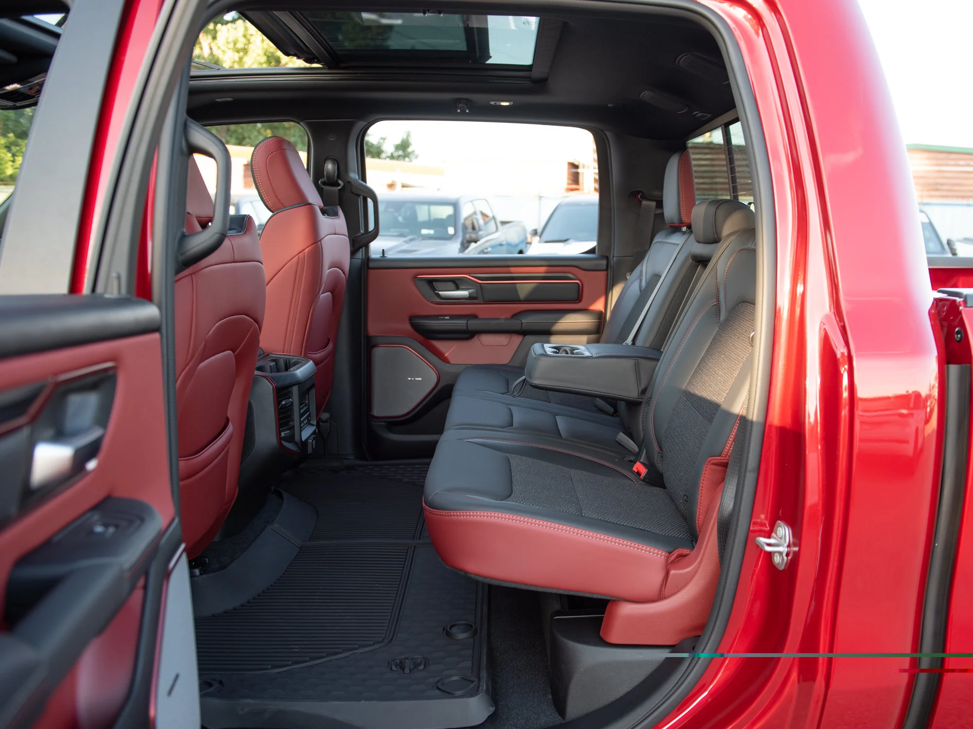 New 2026 Red RAM Rebel* Crew Cab 4x4, Pano Sunroof, 33 Inch A/T Tires, Passenger Screen image 26