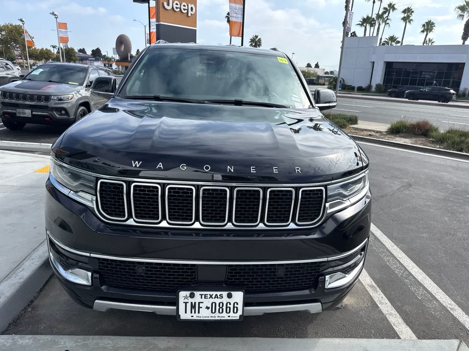 Used 2024 Diamond Black Crystal Pearlcoat Jeep Series II image 5