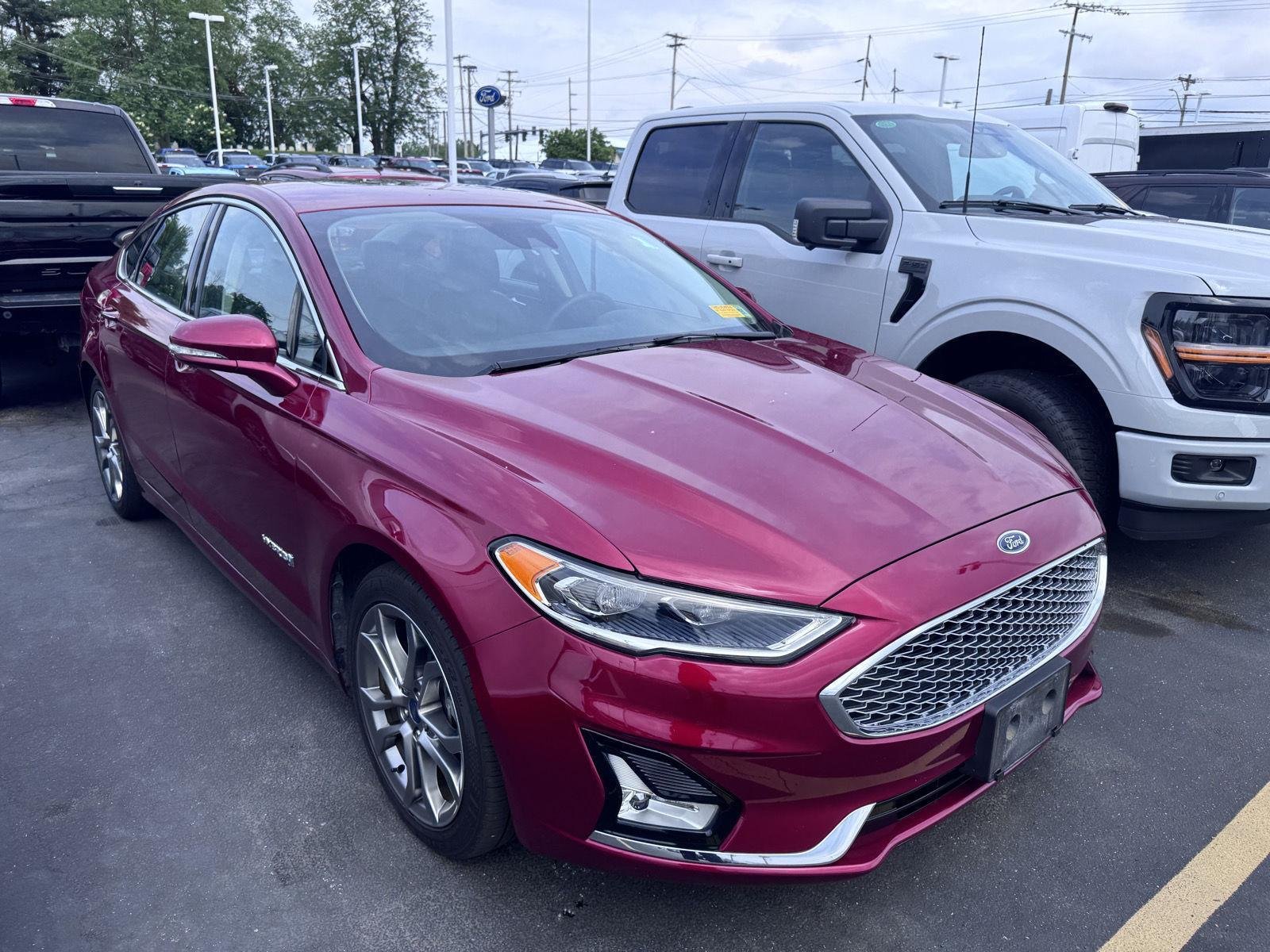 Used 2019 Ruby Red Metallic Tinted Clearcoat Ford Titanium image 3