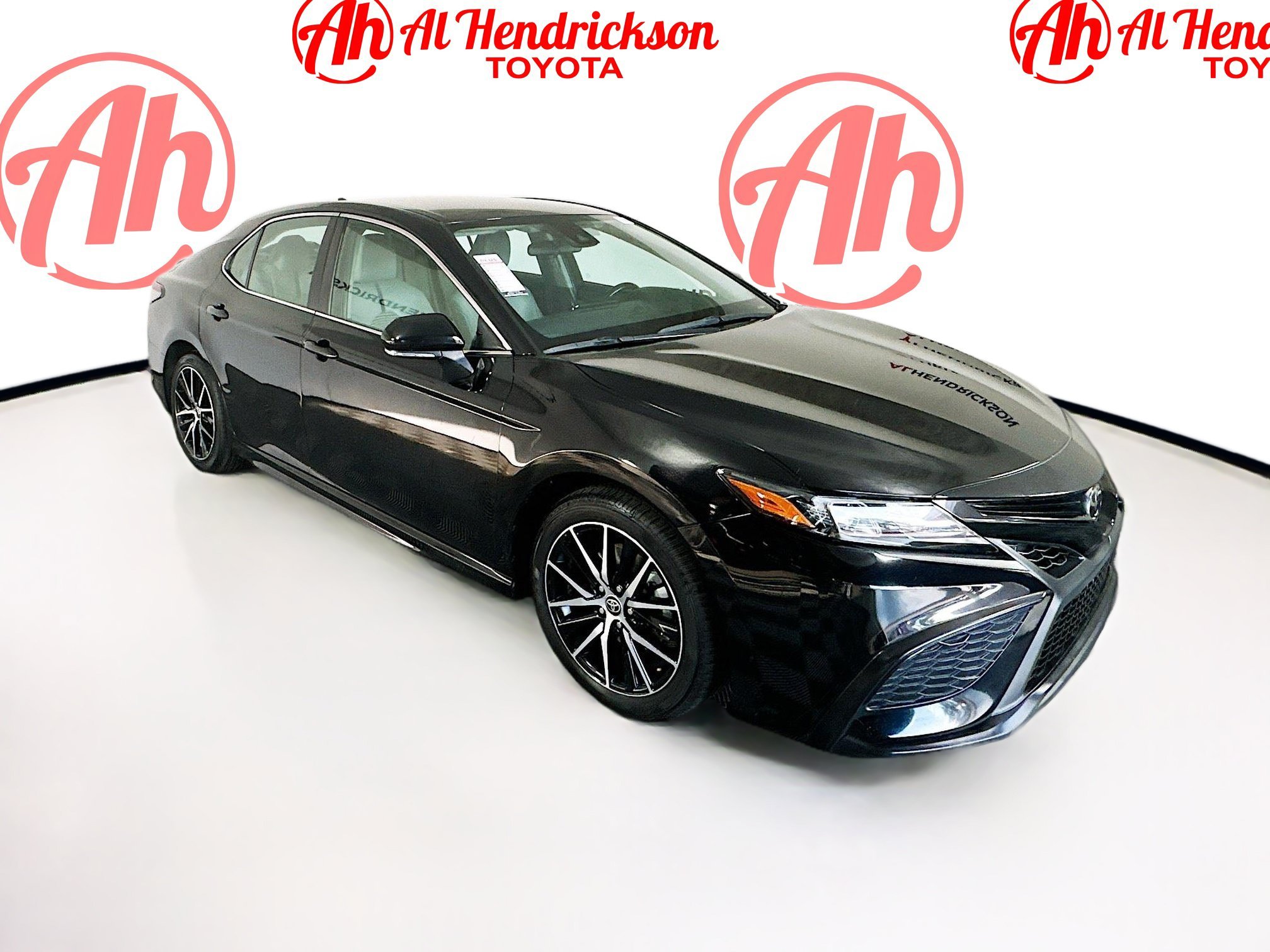 Used 2022 Midnight Black Metallic Toyota SE image 1