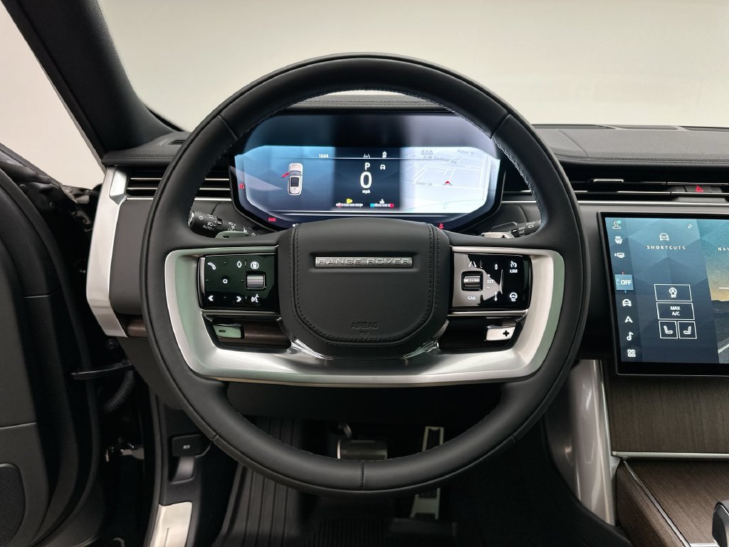 New 2027 Santorini Black Metallic Land Rover SE image 14