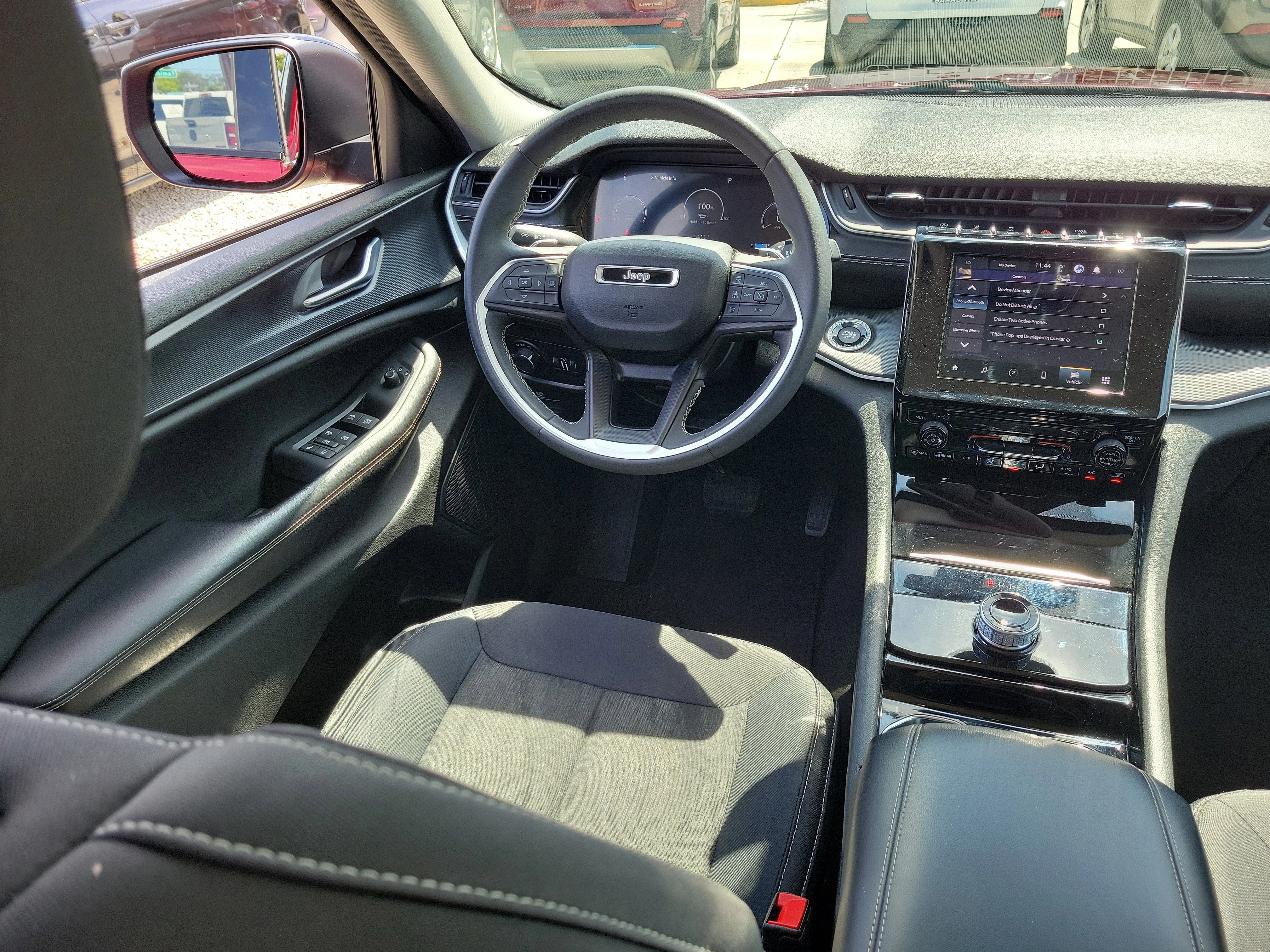 Used 2023 Velvet Red Pearlcoat Jeep Laredo image 18